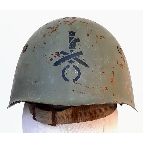 314 - A WW2 Italian M33 Helmet with insignia of the Coastal Artillery.