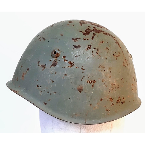 314 - A WW2 Italian M33 Helmet with insignia of the Coastal Artillery.