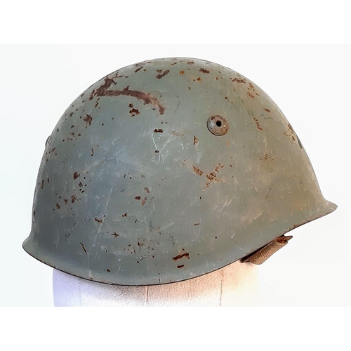 314 - A WW2 Italian M33 Helmet with insignia of the Coastal Artillery.