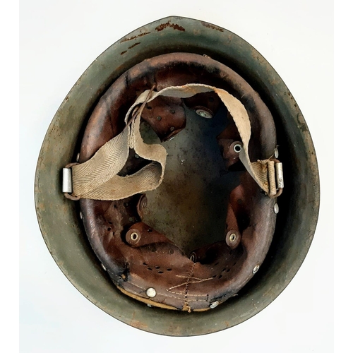 314 - A WW2 Italian M33 Helmet with insignia of the Coastal Artillery.