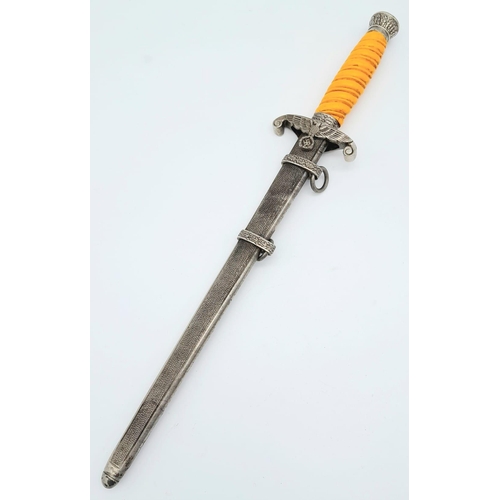 50 - 3rd Reich Late WW2 Unmarked Heer (Army) Officers Dagger. Orange celluloid grip, pommel and ferrule w... 