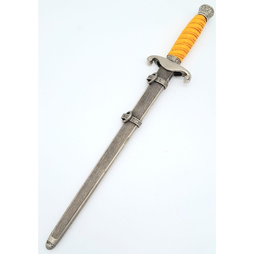 50 - 3rd Reich Late WW2 Unmarked Heer (Army) Officers Dagger. Orange celluloid grip, pommel and ferrule w... 