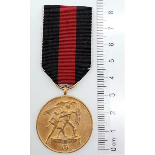 525 - A 3rd Reich Sudetenland Medal. Awarded to all German State officials and members of the German Wehrm... 