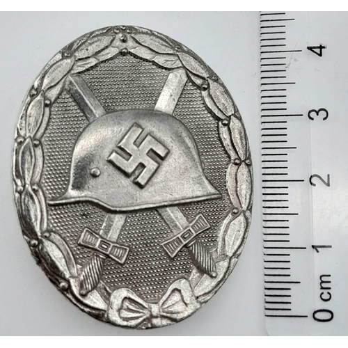 651 - WW2 German Silver Grade Wound Badge. Marked L/56 for the maker Robert Hauschild, Pforzheim.