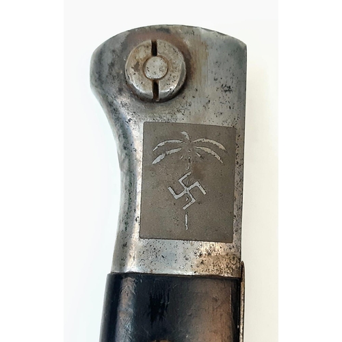 78 - An Africa Corps Mauser K-98 Bayonet and Frog. Etched with the D.A.K logo on the pommel. Privately do... 