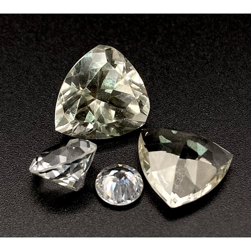 1239 - A Parcel of 4 Quarts. Assorted Sizes and Cuts. 13.53 Carats Total.