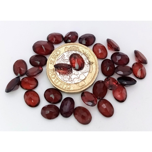 1330 - A Parcel of 28 Turkish Garnets, Oval Cut. 45.61 Carats Total.