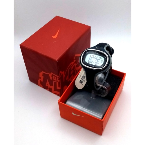 1372 - An Unworn, Sought after Model, Nike Lady Fitness Watch with Box, Tags and Manual. New Battery Fitted... 