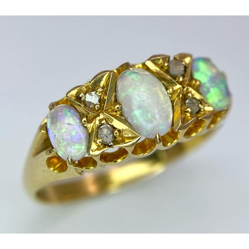 154 - A Mesmerising Antique 18K Yellow Gold, Opal and Diamond Ring. Three beautiful colour-play opals sepa... 