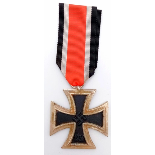 644 - A WW2 German Iron Cross 2nd Class. 3 part construction with an iron core.