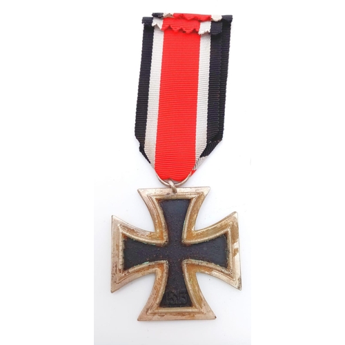 644 - A WW2 German Iron Cross 2nd Class. 3 part construction with an iron core.