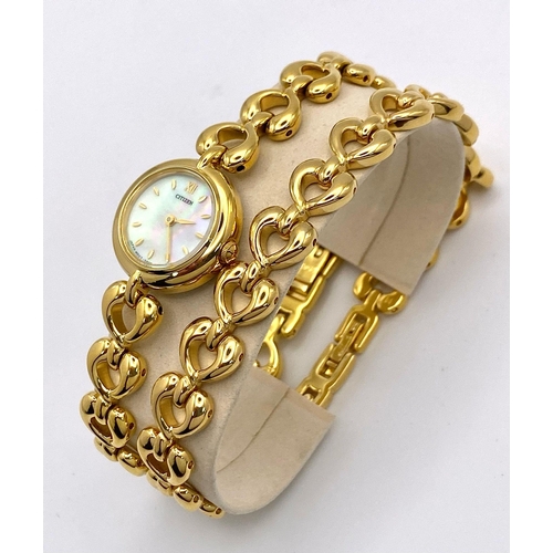 891 - A Citizen Gold Plated Quartz Ladies Watch with Matching Bracelet. Mother of pearl dial. In working o... 