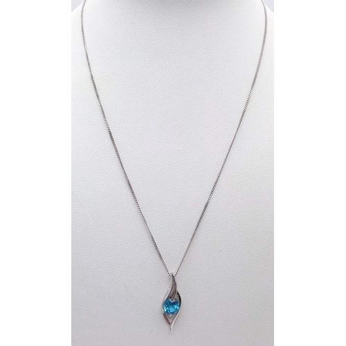 922 - An Unworn Sterling Silver and Blue Topaz Set Necklace in Treasure Chest Presentation Box. Sterling S... 