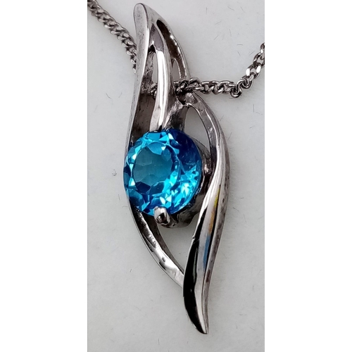 922 - An Unworn Sterling Silver and Blue Topaz Set Necklace in Treasure Chest Presentation Box. Sterling S... 