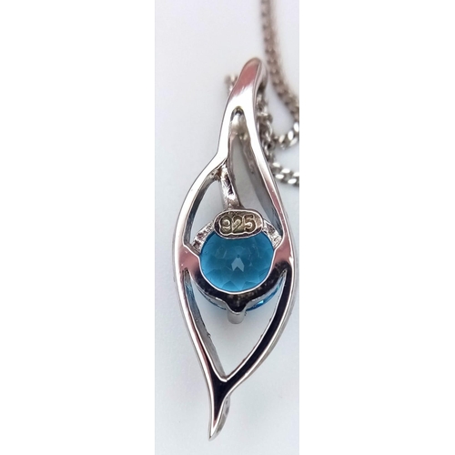 922 - An Unworn Sterling Silver and Blue Topaz Set Necklace in Treasure Chest Presentation Box. Sterling S... 