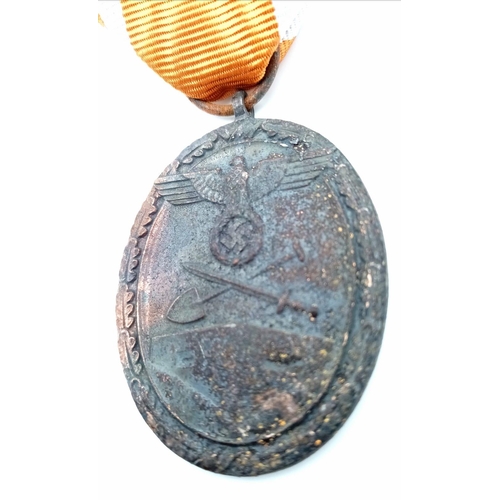 1036 - WW2 German West Wall Medal awarded to those who had built or served on the Siegfried Line. With the ... 