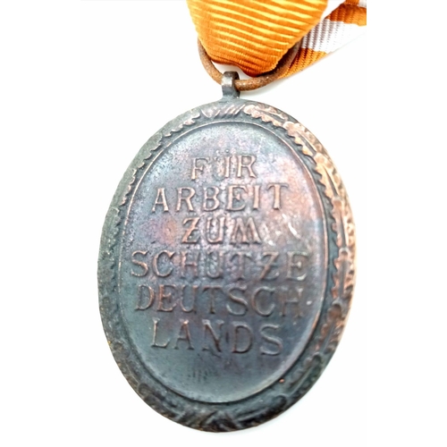 1036 - WW2 German West Wall Medal awarded to those who had built or served on the Siegfried Line. With the ... 