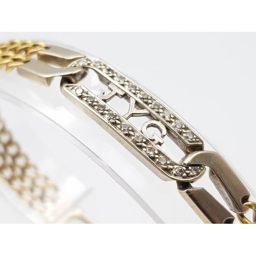 106 - An 18K Yellow and White gold Diamond Bracelet. A double row of flat yellow gold curb links connect t... 