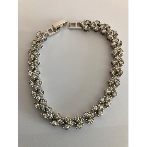 111 - Fabulous SILVER TENNIS BRACELET Set with 75 clear white sparkling Zirconias. 17cm.