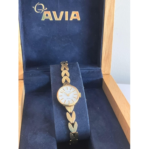 118 - Ladies 9 carat GOLD AVIA WRISTWATCH with integral 9 carat GOLD BRACELET STRAP. Quartz movement. Full... 