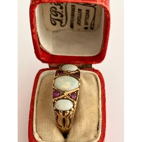 139 - Vintage 9 carat YELLOW GOLD,OPAL and RUBY RING. Full UK hallmark. Complete with jewellers vintage ri... 