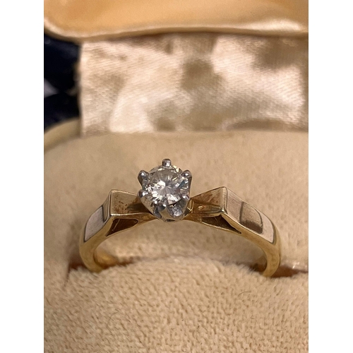 264 - 18 carat YELLOW GOLD and DIAMOND SOLITAIRE RING. Fully hallmarked and complete with Jewellers ring b... 