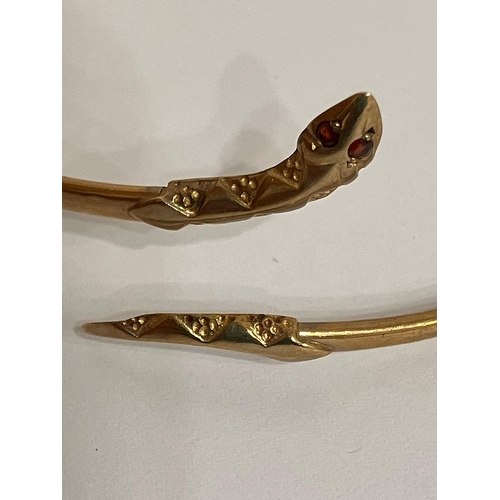 299 - 9 carat YELLOW GOLD SNAKE BRACELET/BANGLE. Gemstone eyes. Full UK hallmark. 5 grams.