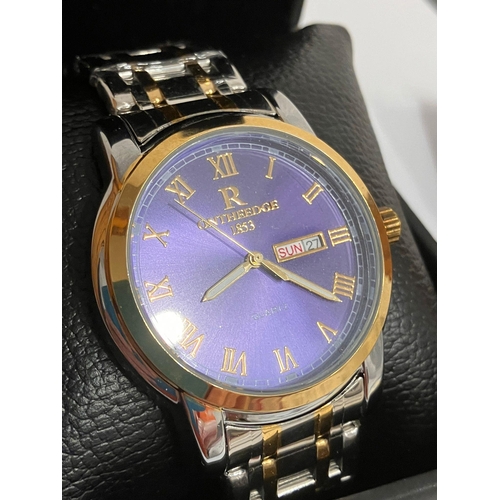 306 - Gentlemans ON THE EDGE Quartz Wristwatch. Day/date model, having royal blue face with golden Roman n... 