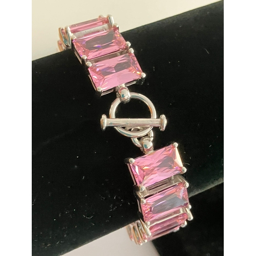 341 - Fabulous SILVER and ROSE QUARTZ PANEL BRACELET. Having 17 Emerald Cut Gemstones set and mounted with... 