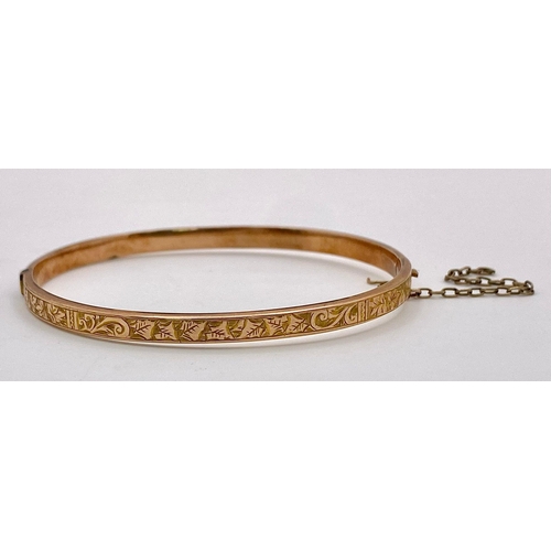 421 - A Vintage 9K Rose Gold Bangle. Clip open design. 6cm inner diameter. 4.5g weight.