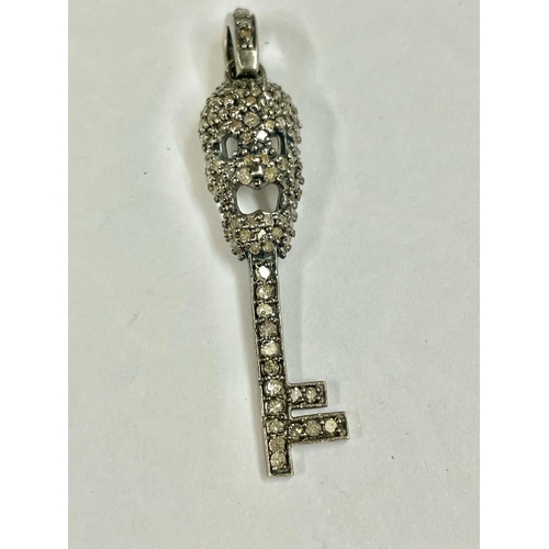 779 - Diamond encrusted memento mori skull key pendant . 4.5cm .