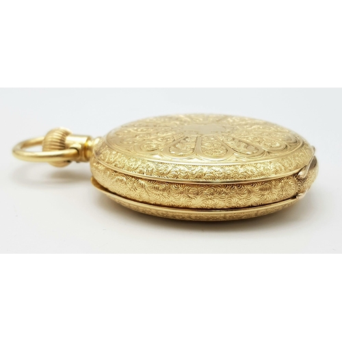 15 - An Antique Waltham 18K Gold Full Hunter Pocket Watch. The case is ornately decorated in a floral pat... 