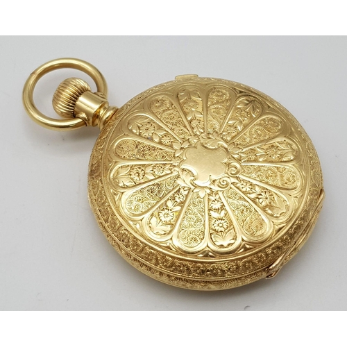 15 - An Antique Waltham 18K Gold Full Hunter Pocket Watch. The case is ornately decorated in a floral pat... 