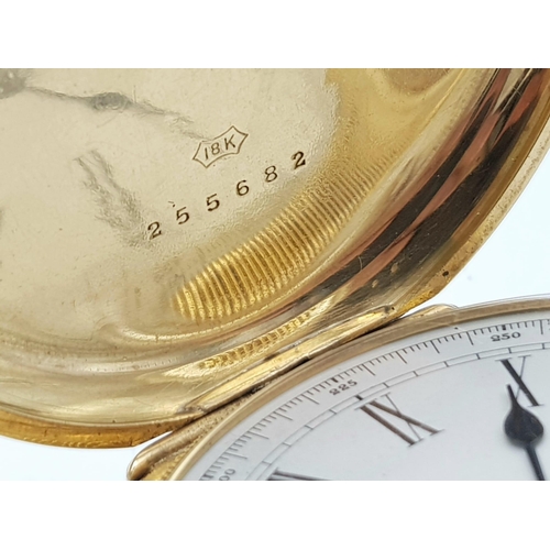 15 - An Antique Waltham 18K Gold Full Hunter Pocket Watch. The case is ornately decorated in a floral pat... 