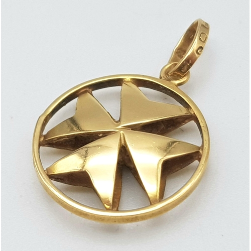 189 - AN 18K GOLD MALTESE CROSS PENDANT .   1.9gms     1.6cms diameter