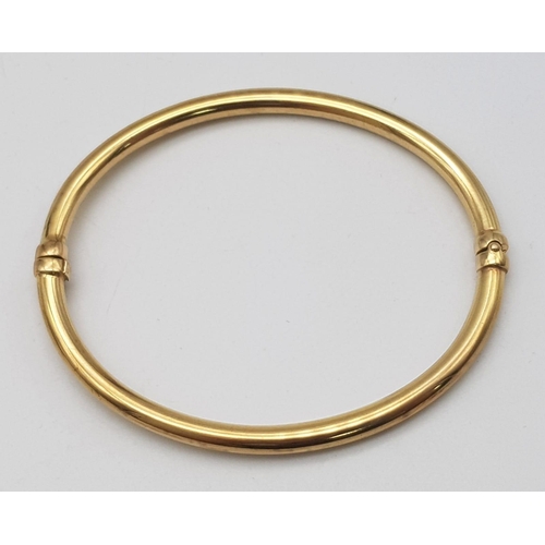 270 - 9K YELLOW GOLD BANGLE (SMALL INSIDE DENT) - 5.5G TOTAL WEIGHT - 6CM DIAMETER