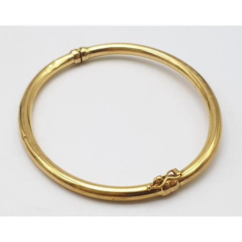 270 - 9K YELLOW GOLD BANGLE (SMALL INSIDE DENT) - 5.5G TOTAL WEIGHT - 6CM DIAMETER