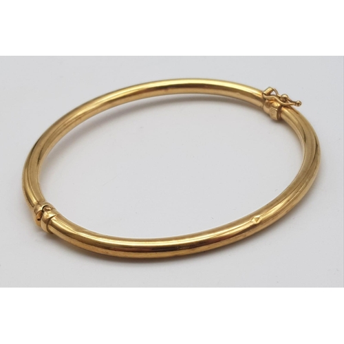 270 - 9K YELLOW GOLD BANGLE (SMALL INSIDE DENT) - 5.5G TOTAL WEIGHT - 6CM DIAMETER