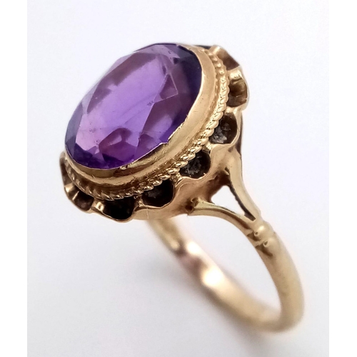 304 - A VINTAGE 9K YELLOW GOLD AMETHYST RING - 2.4CT FACETED OVAL AMETHYST SOLITAIRE STONE- 2.3G TOTAL WEI... 