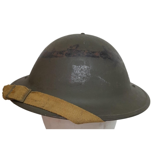 364 - WW2 1943 Dated British Mk II Helmet, with insignia of the Gurkha Brigade. The makers stamp RO & CO c... 