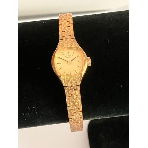 377 - Ladies Vintage ROTARY WRISTWATCH. Finished in gold tone with integral bracelet strap. Complete with ... 