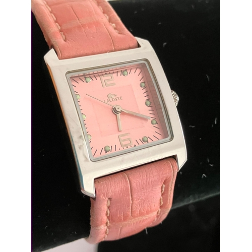 405 - Ladies LACOSTE WRISTWATCH. Finished in stainless steel silver tone.Pink Square face. Model 6800L. Pi... 