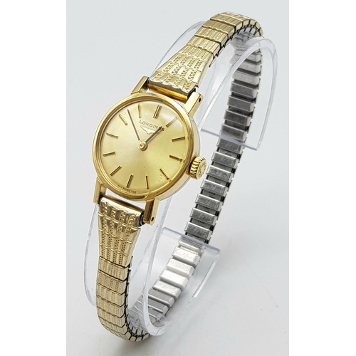 429 - A Stylish Vintage Longines Ladies Watch. Expandable gold plated bracelet, case - 21mm. Champagne dia... 