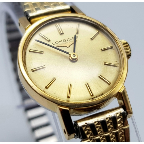 429 - A Stylish Vintage Longines Ladies Watch. Expandable gold plated bracelet, case - 21mm. Champagne dia... 