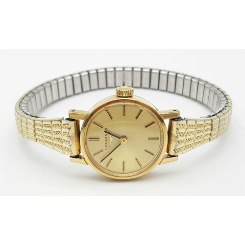 429 - A Stylish Vintage Longines Ladies Watch. Expandable gold plated bracelet, case - 21mm. Champagne dia... 