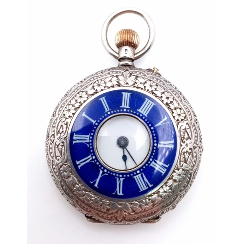 750 - Two Antique Silver Items: A miniature hallmarked (935) pocket watch with enamel decoration. 3.5cm di... 