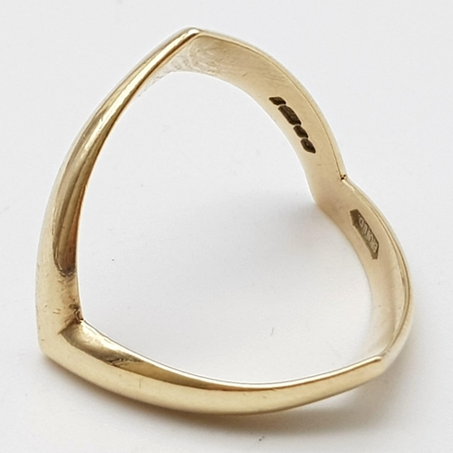 120 - A 9K GOLD WISHBONE RING .  4gms   size S