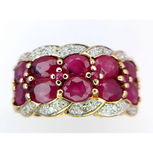 144 - A 9K YELLOW GOLD DIAMOND & RUBY FANCY RING 4.5G SIZE P

SC 4035