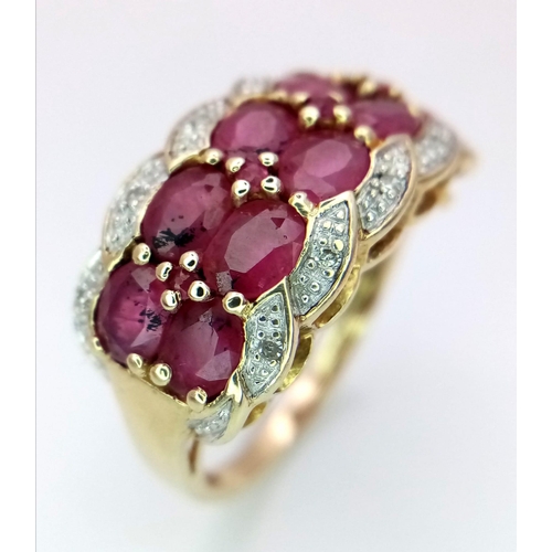 144 - A 9K YELLOW GOLD DIAMOND & RUBY FANCY RING 4.5G SIZE P

SC 4035