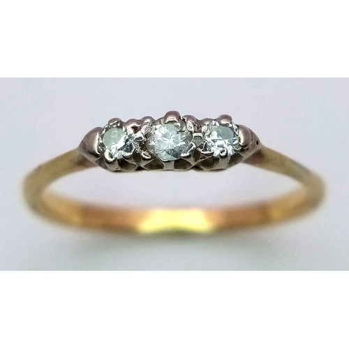 169 - A Vintage 18K Yellow Gold Diamond Trilogy Ring. 0.40ctw of brilliant round cut diamonds. Size M 1/2.... 